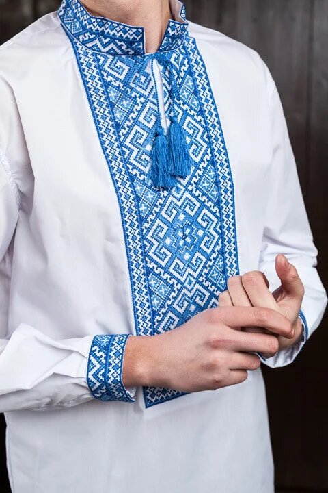 White shirt with blue ornament