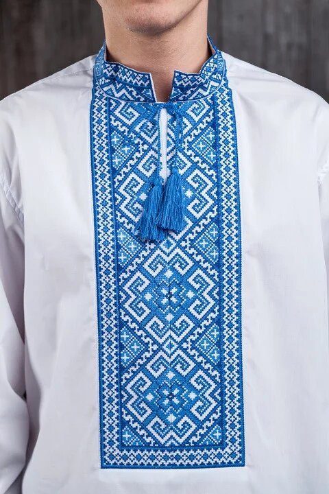 White shirt with blue ornament