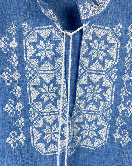 Boy blue shirt with cross embroidery