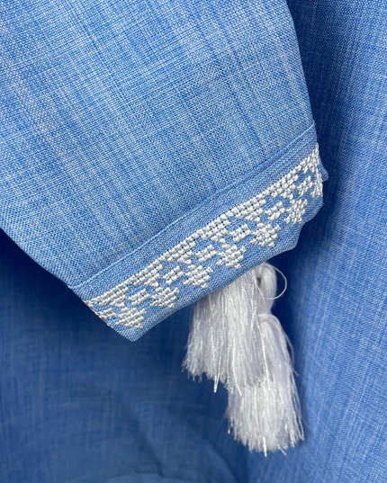 Boy blue shirt with cross embroidery