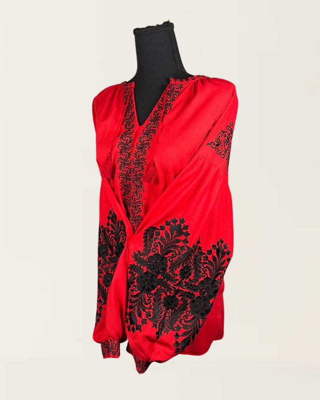 Red blouse with black embroidery