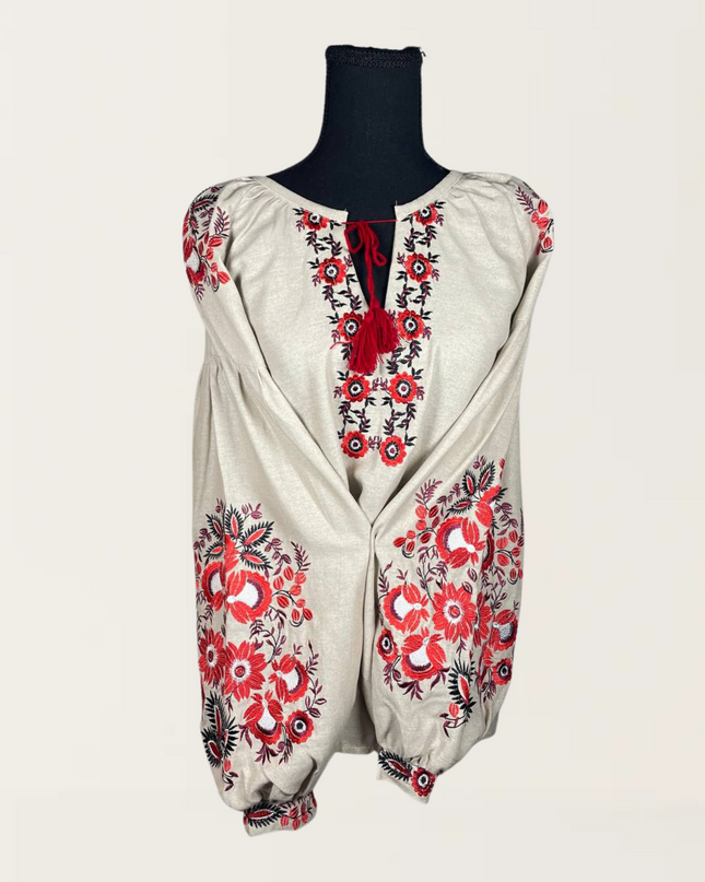 Beige blouse with daisies