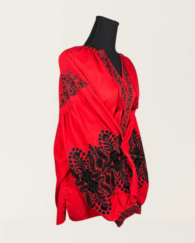 Red blouse with black embroidery