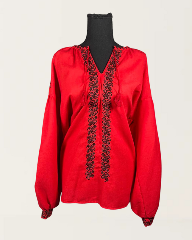 Red blouse with black embroidery