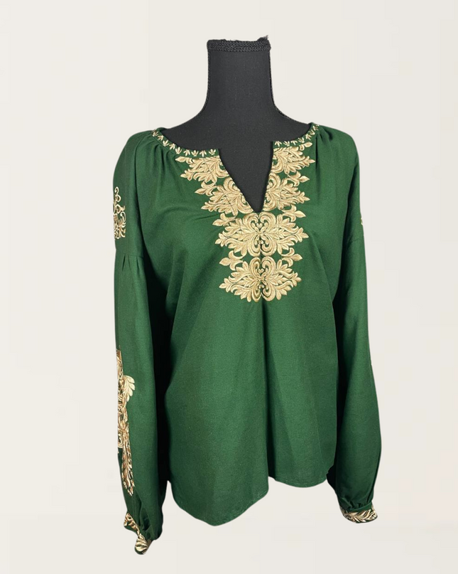 Elegant green blouse adorned with intricate gold embroidery, featuring a stylish V-neck and long sleeves.