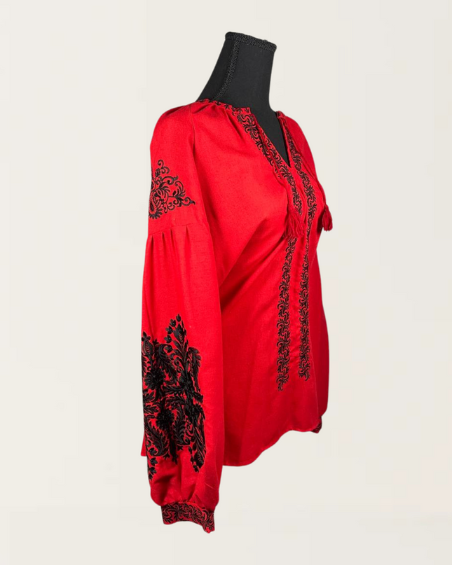 Red blouse with black embroidery