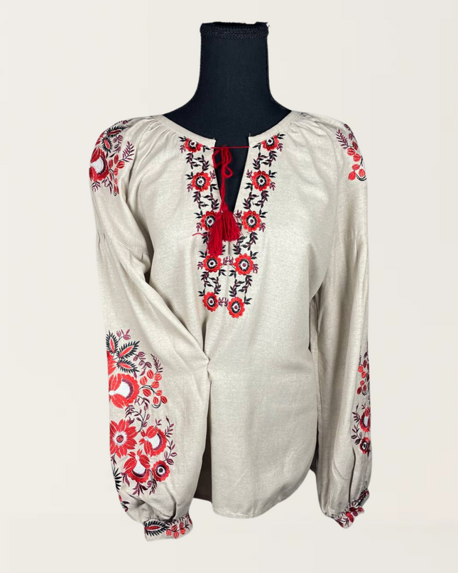 Beige blouse with daisies