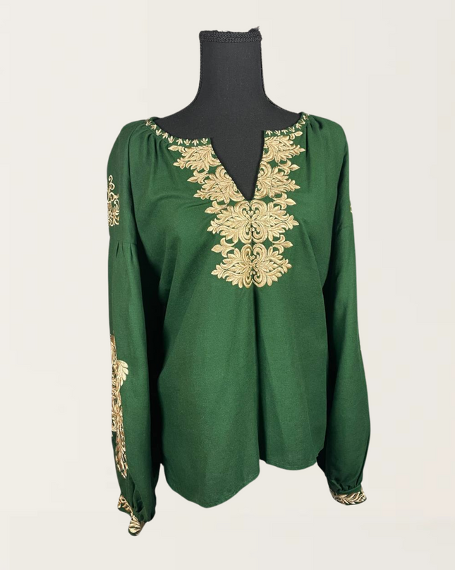 Green blouse featuring intricate gold embroidery on the front and sleeves, perfect for stylish occasions.