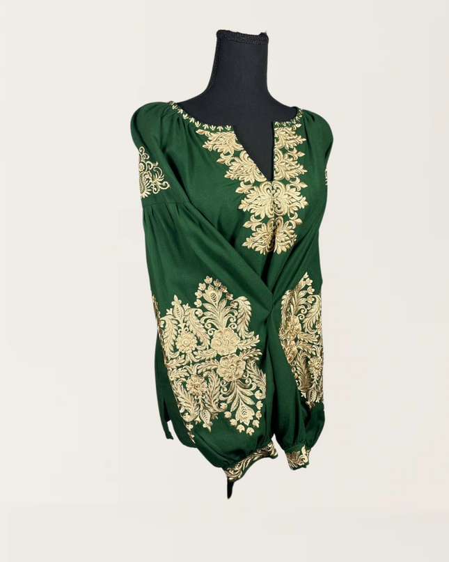 Green blouse featuring intricate gold embroidery, perfect for stylish and elegant attire.