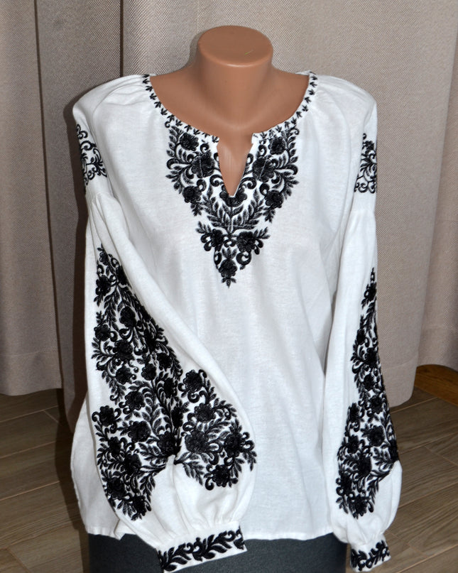 White embroidery blouse