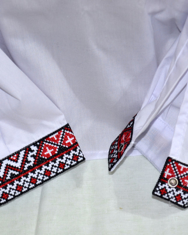 White shirt with red ornament