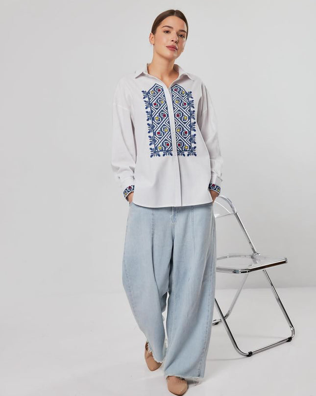 White shirt with cross embroidery